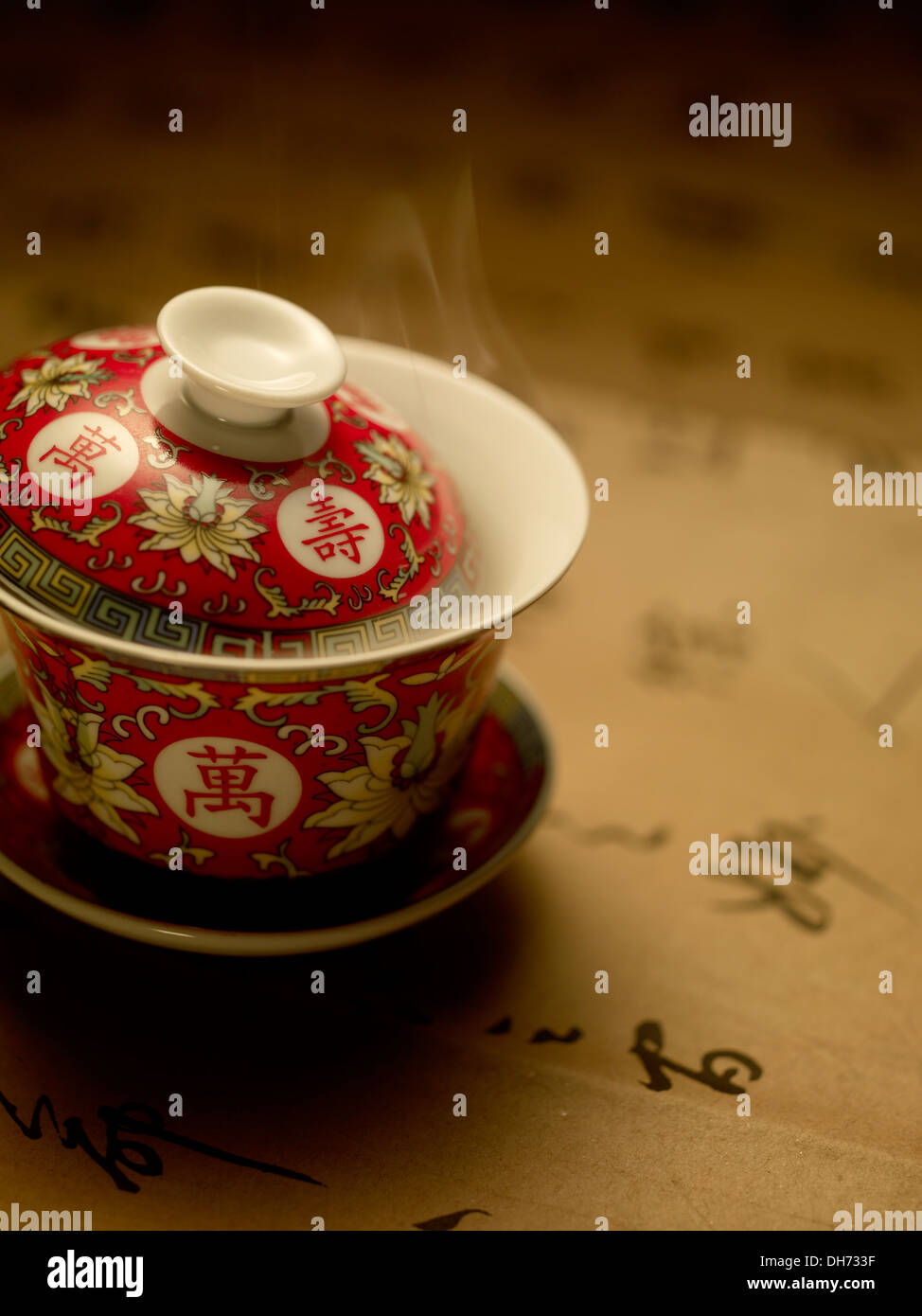 Chinese style tea cup with floral pattern and greeting words Stock Photo Alamy