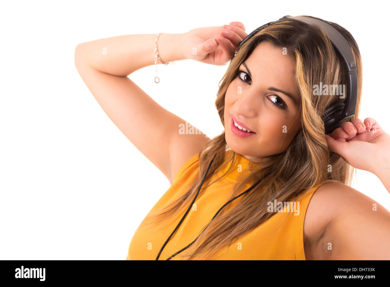 Happy young woman listening to music Stock Photo - Alamy