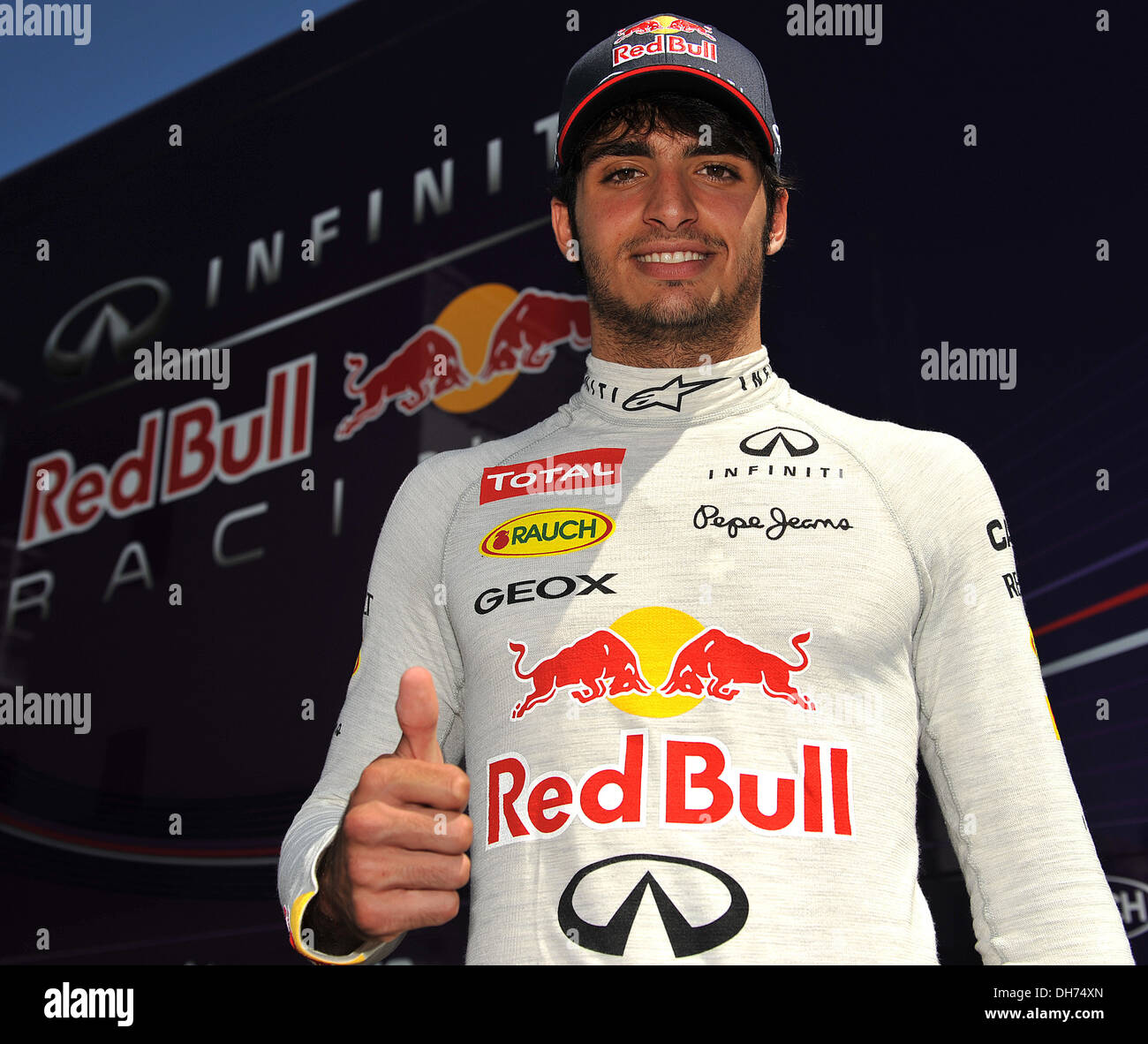 Carlos Sainz Jnr of Red Bull Racing conducting interviews after his run