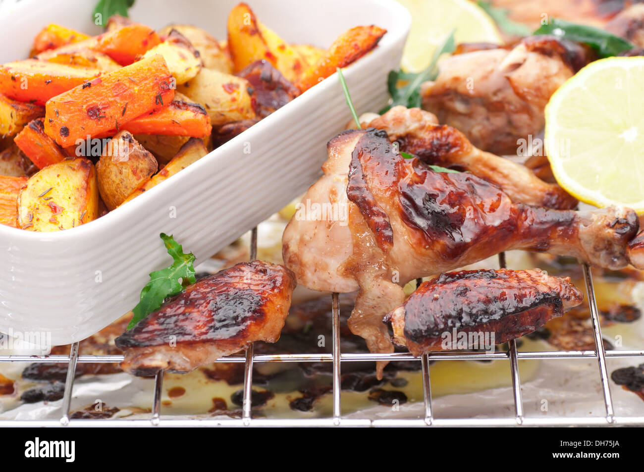 Oven roasted quartered organic chicken. Stock Photo