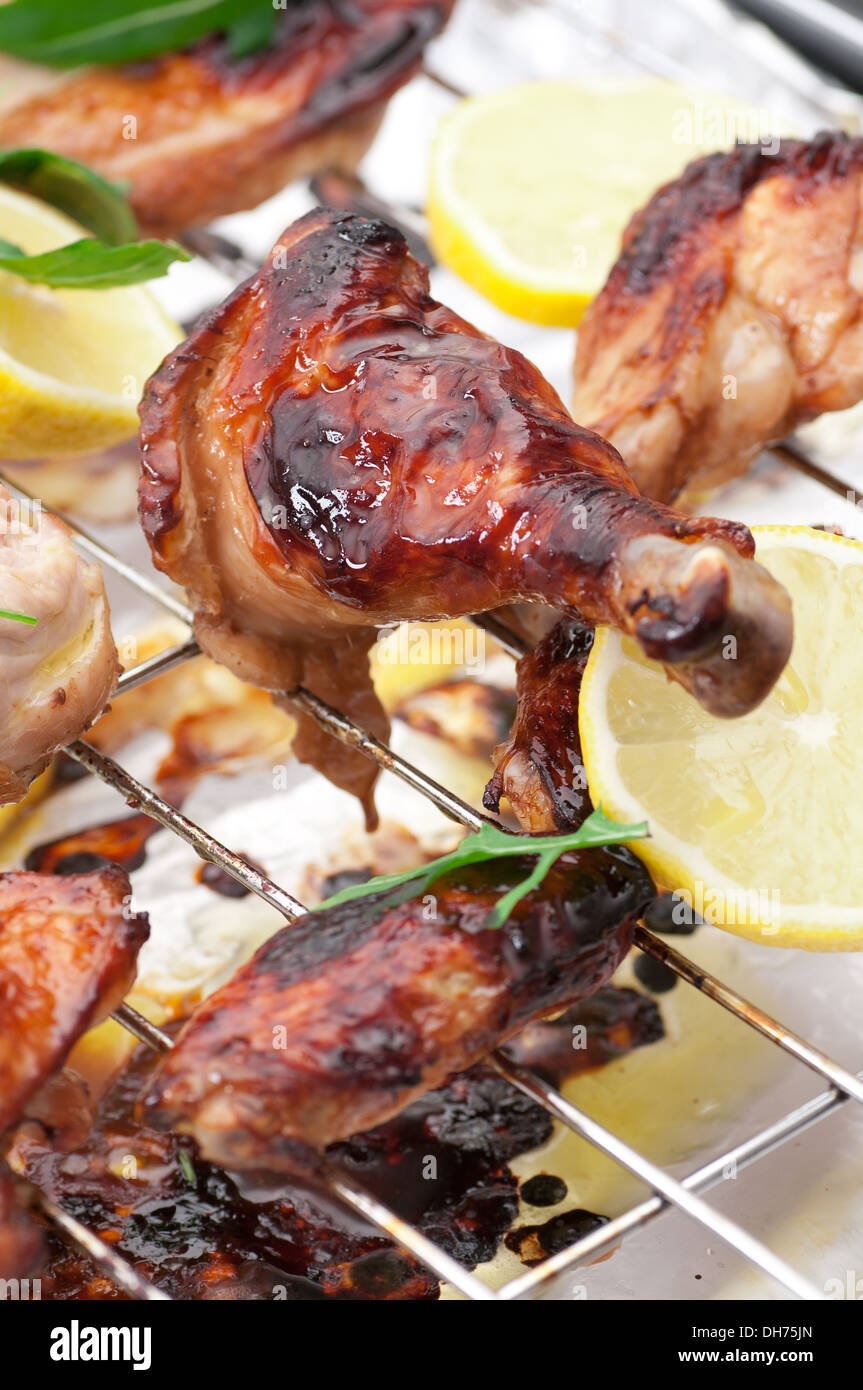 Oven roasted quartered organic chicken. Stock Photo