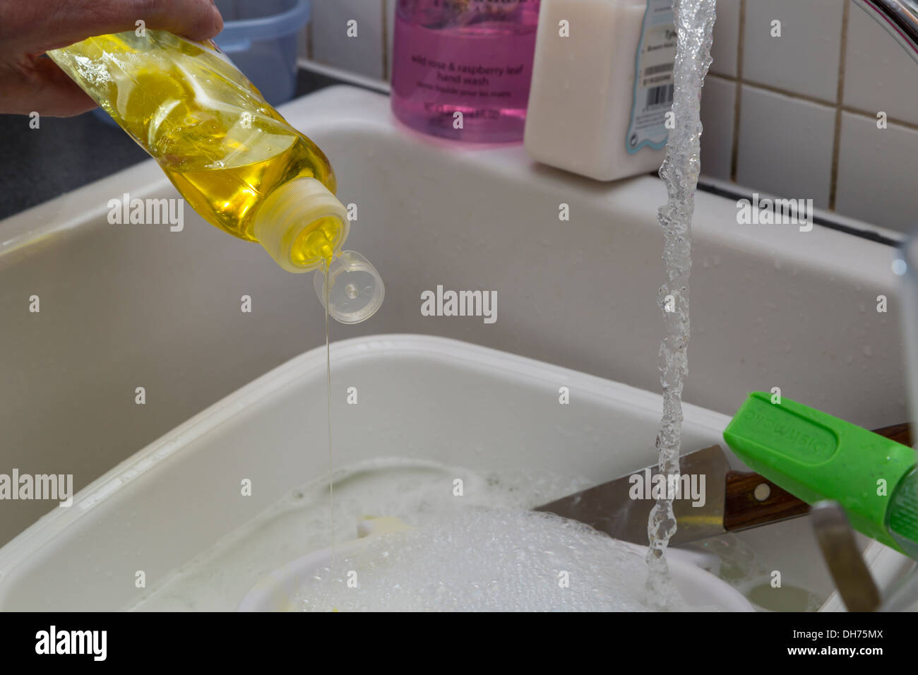 Washing up after preparing food. Stock Photo