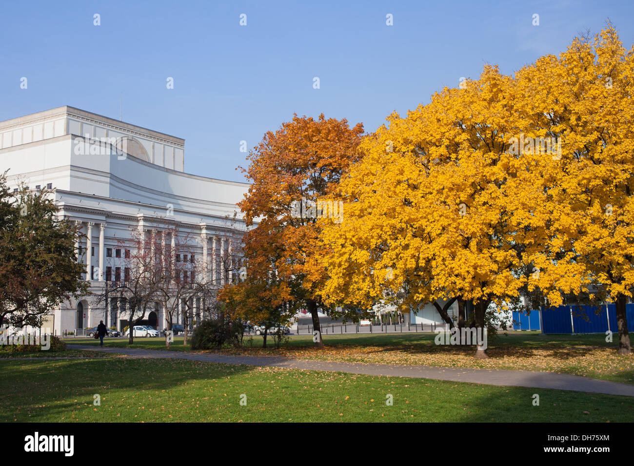 The Saxon Garden (Polish: Ogrod Saski) in autumn and Grand Theatre building in the background, Warsaw, Poland. Stock Photo