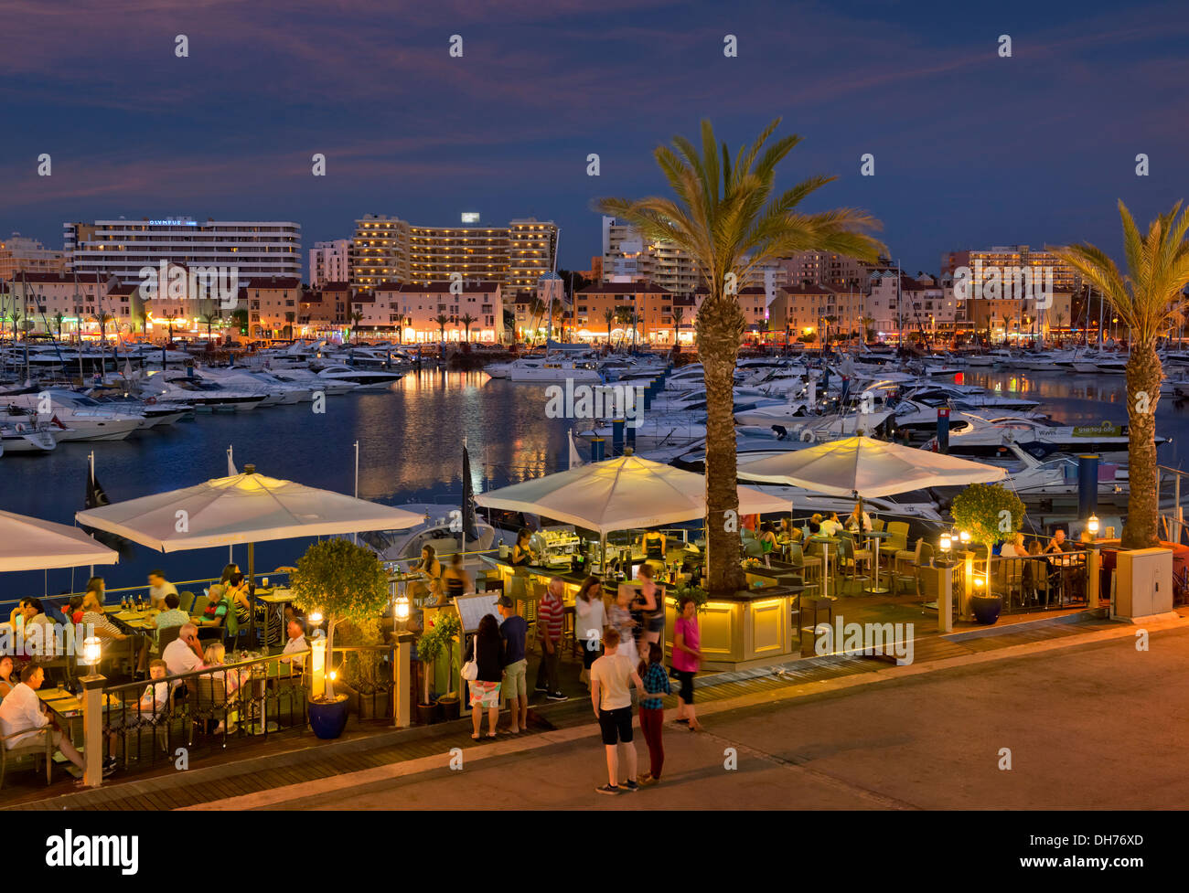Portugal, the Algarve, Vilamoura marina restaurants at night Stock Photo