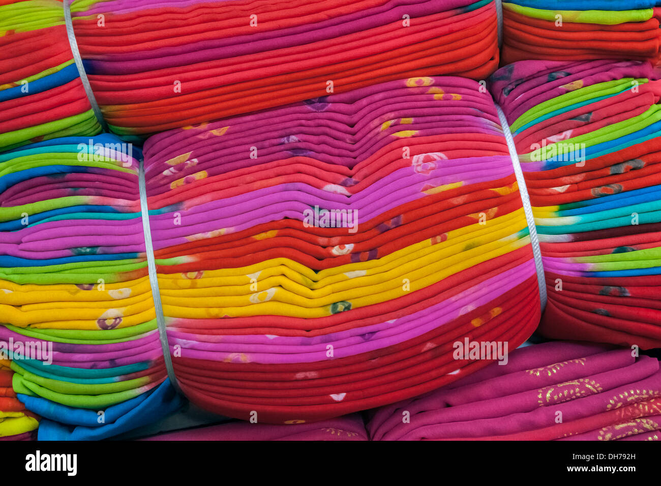 India, Rajasthan, Jodhpur, stacks of bundled textile fabrics Stock