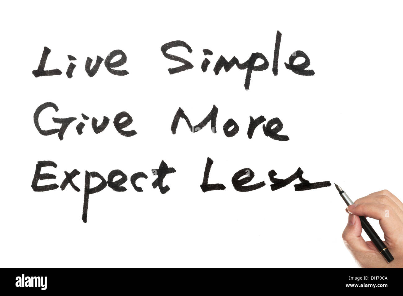 Live simple, give more, expect less words on white board Stock Photo
