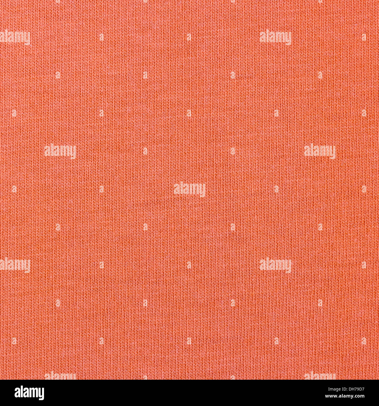 Orange fabric texture close up. Knitted netting Stock Photo