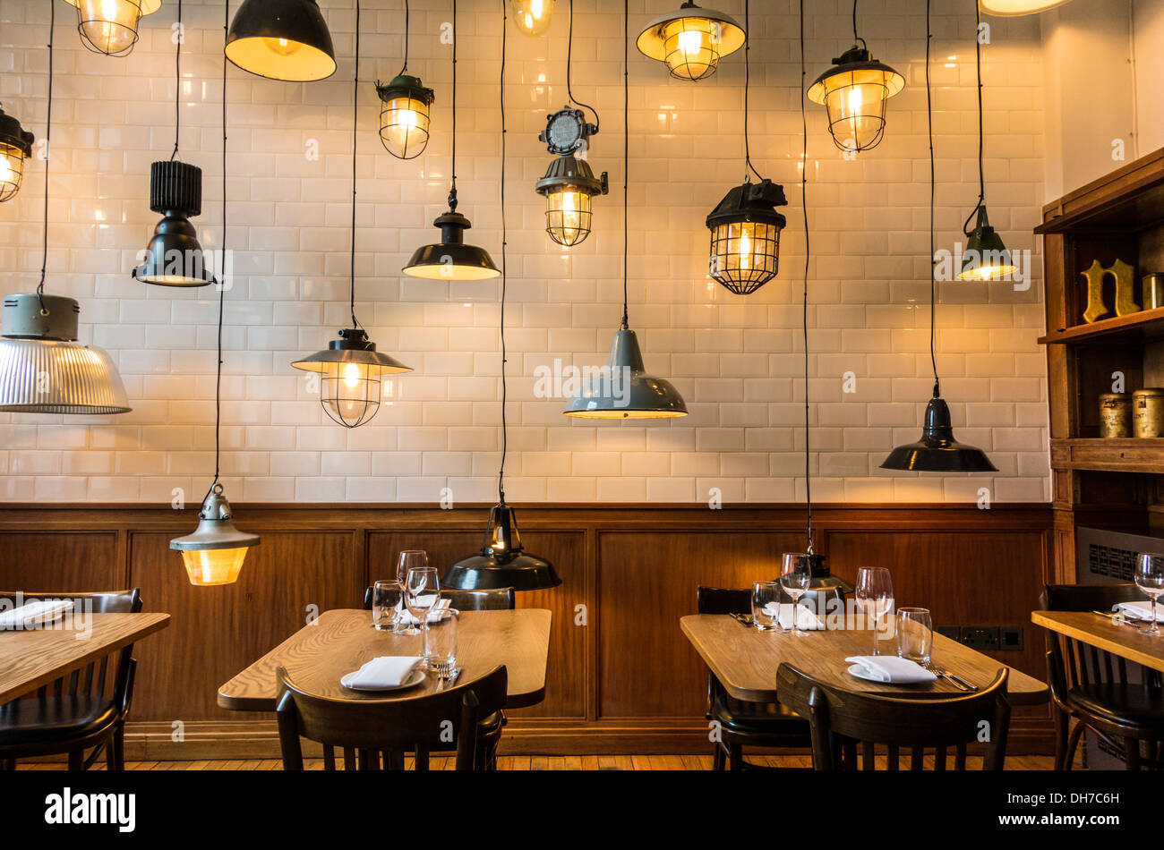 Unusual interior design with lights of Corner Room Restaurant within Town Hall Hotel in Bethnal Green, London, UK Stock Photo