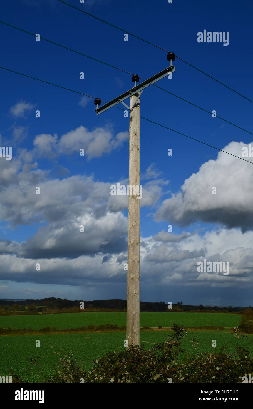 Wooden electricity pole in English countryside. Stock Photo