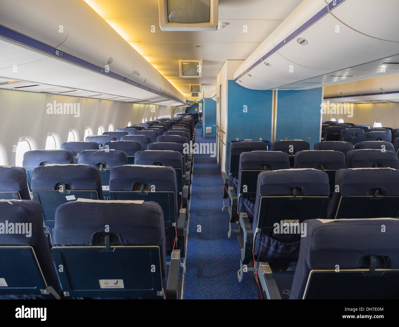Inside the passenger cabin of a jumbo jet airliner Stock Photo