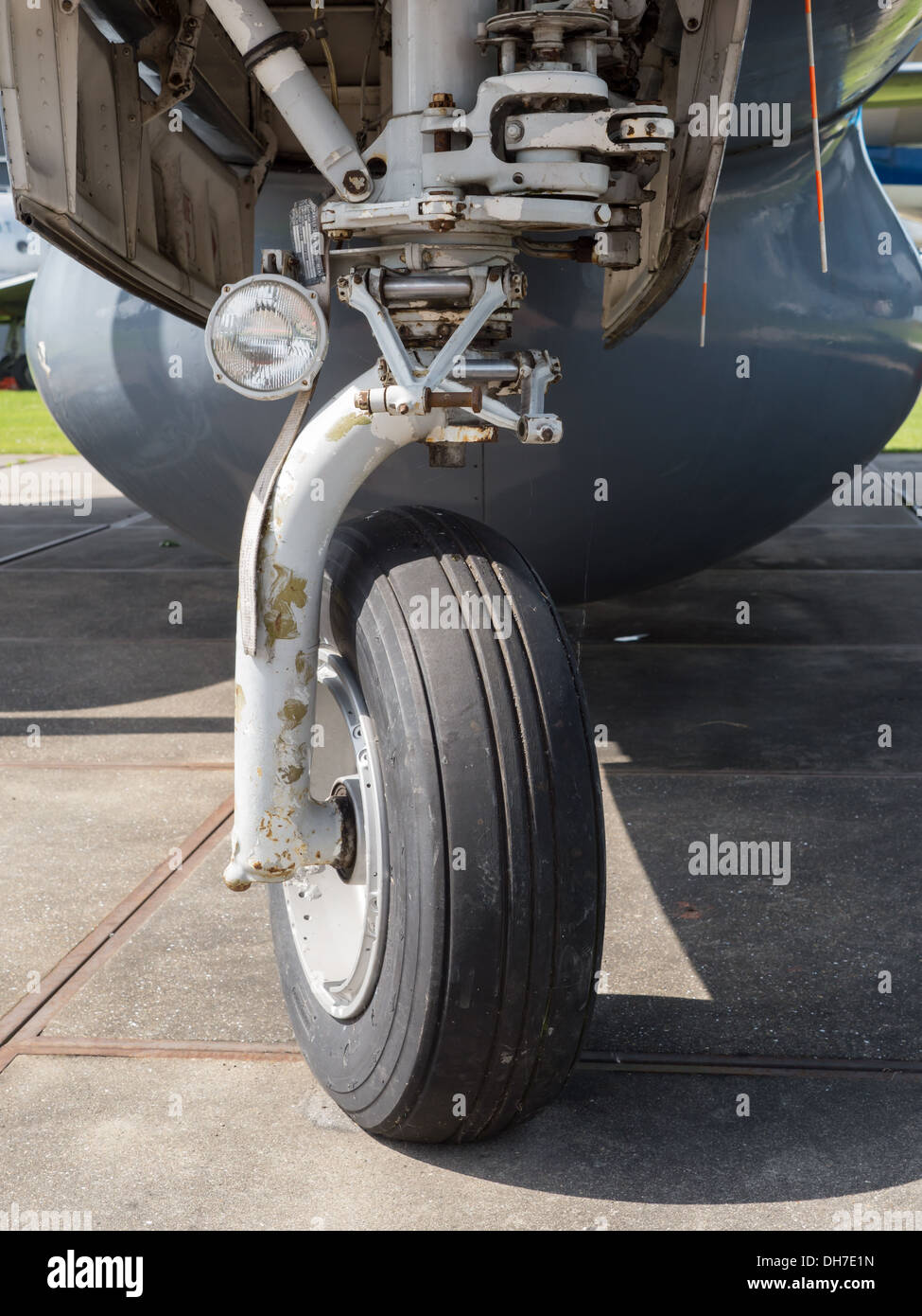 Nose landing wheel of a vintage airplane Stock Photo
