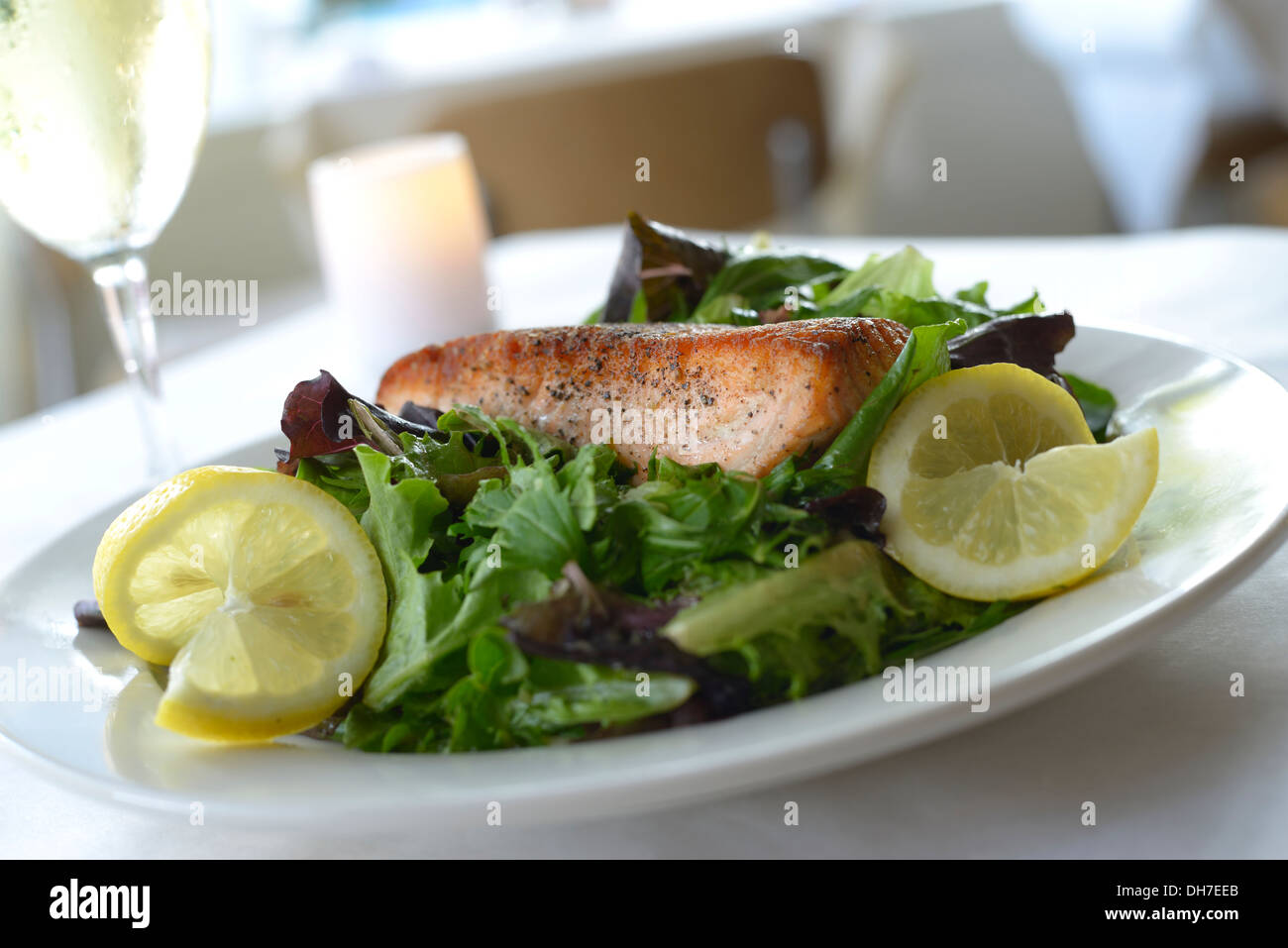 Serving Salmon lunch or dinner, using organic, local and seasonal ingredients. Stock Photo