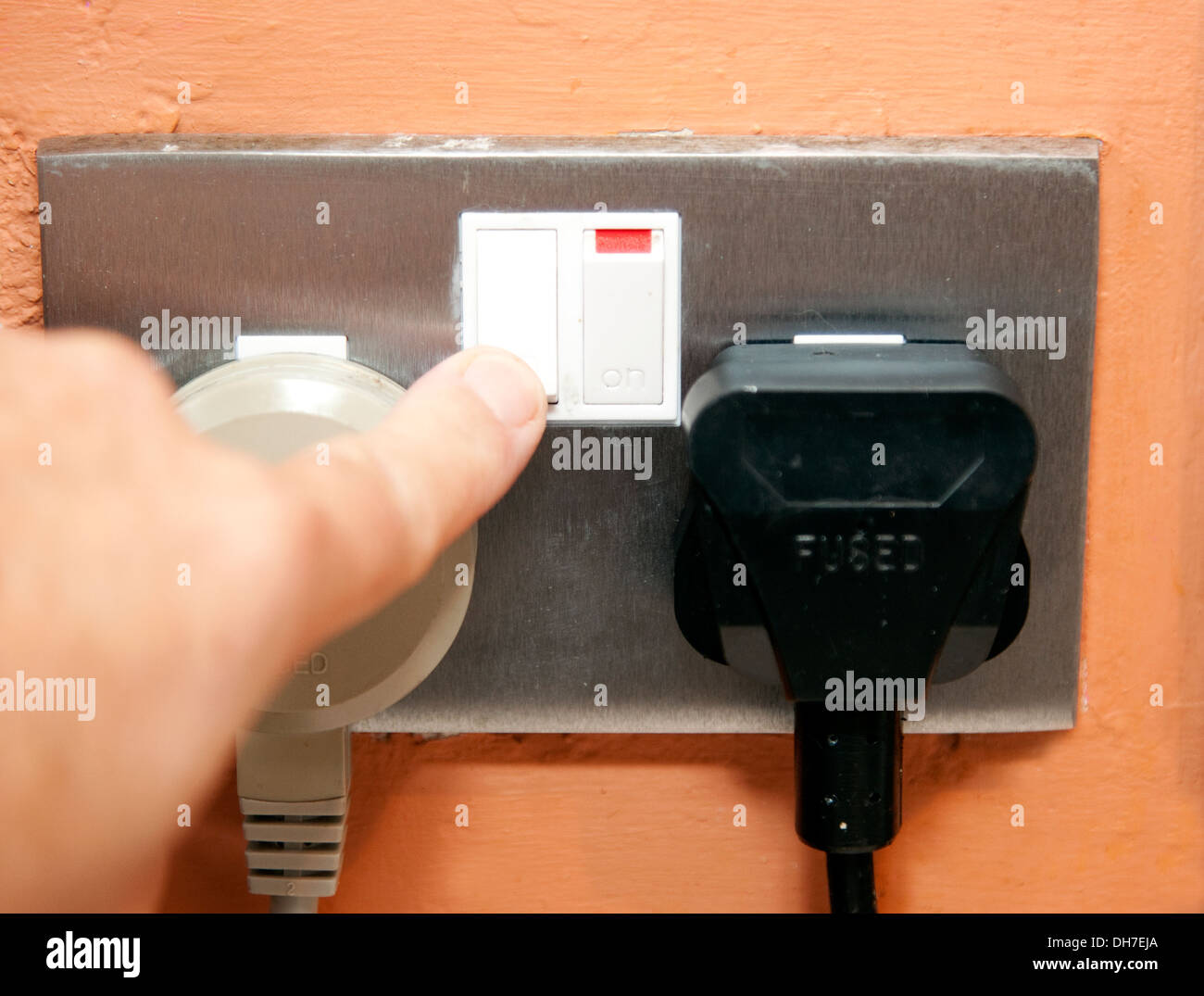 Switching off button plug socket hires stock photography and images