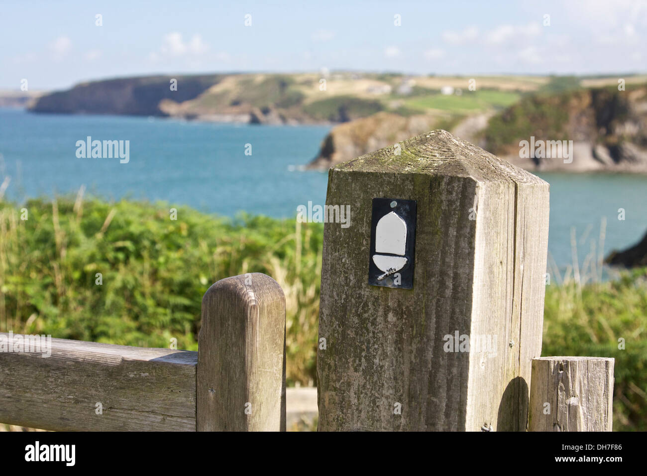 National trust coastal path sign on weathered wooden post Stock Photo ...