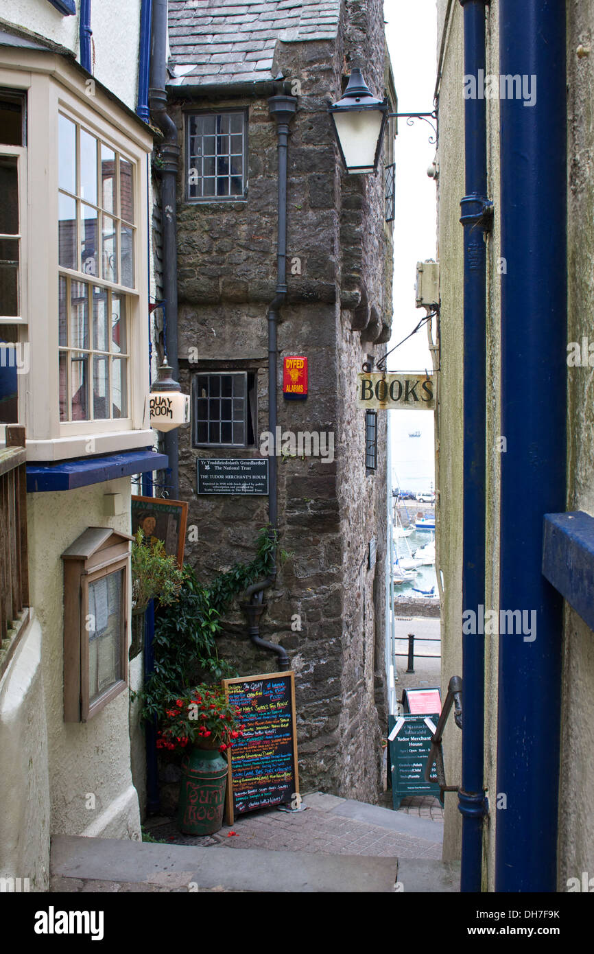 Narrow alleyway leading to harbour, Tenby, Wales, UK Stock Photo
