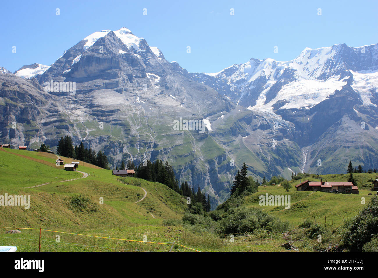 Picturesque landscapes of the snow covered Jungfrau mountain peak in the Swiss Alps of Gimmelwald Switzerland Europe. Stock Photo