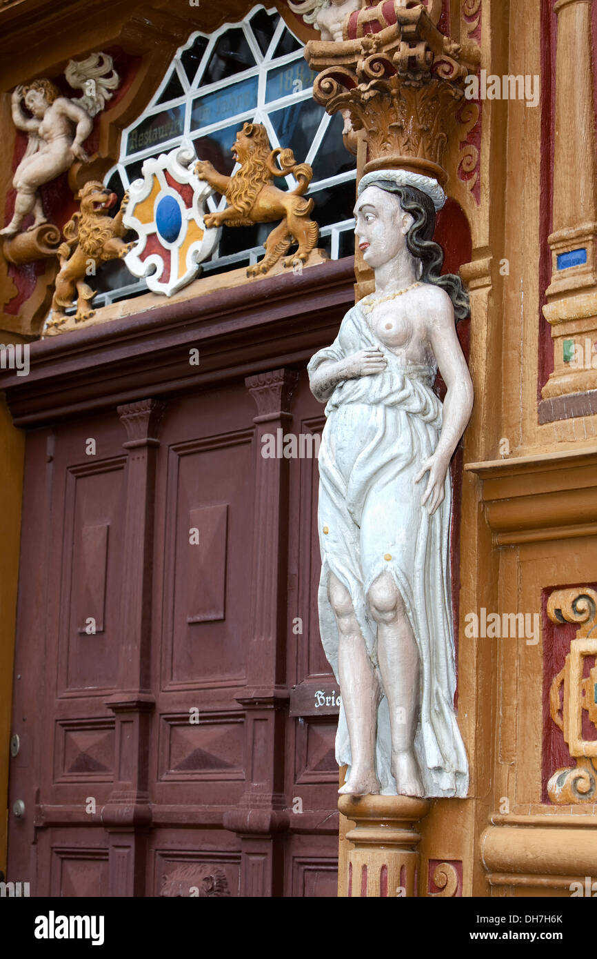 carved figures, Old Latin School decorated with wood carvings, 17th century, Alfeld, Leine, Lower Saxony, Germany, Europecarved Stock Photo