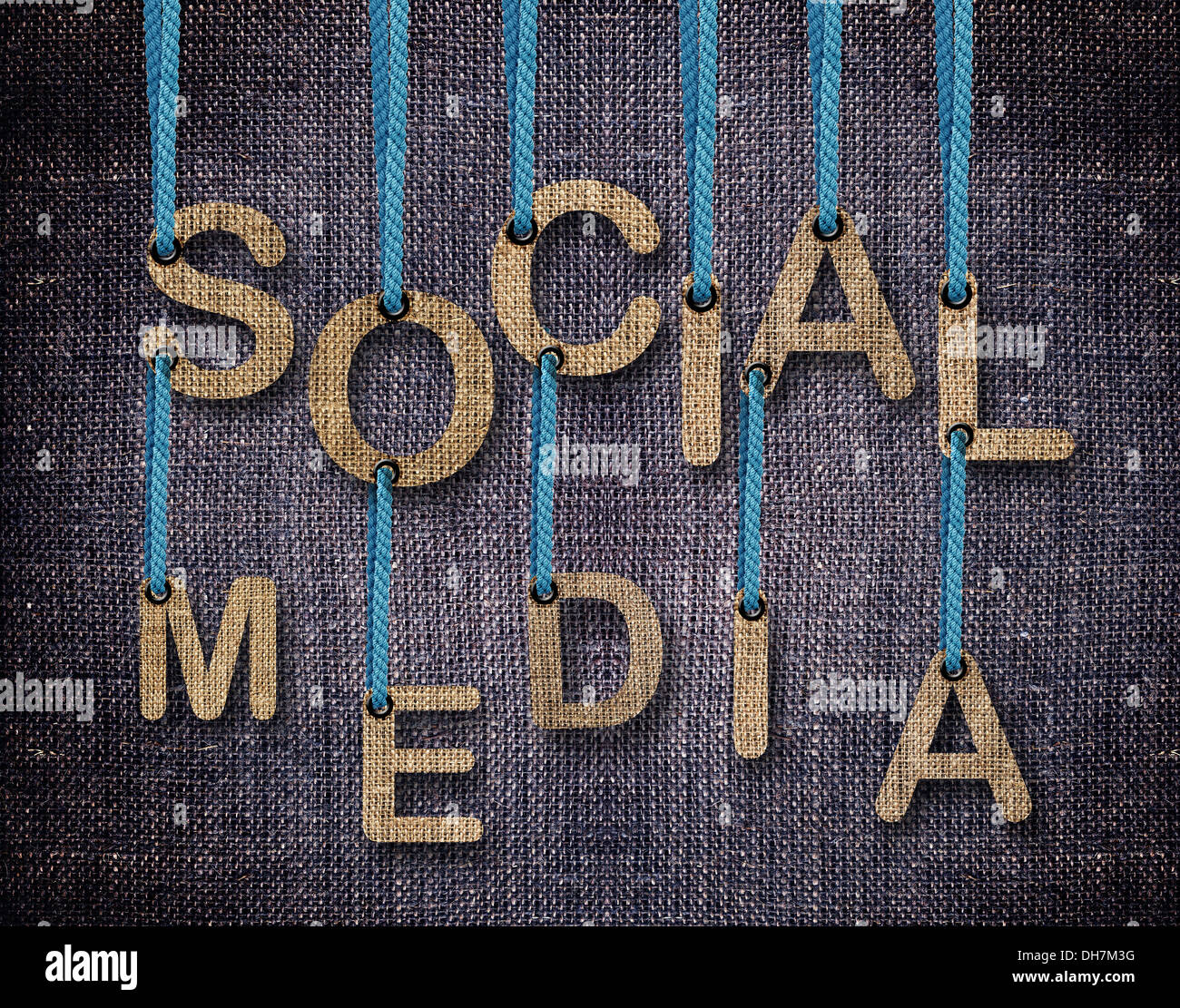 Social Media etters hanging strings with blue sackcloth background ...