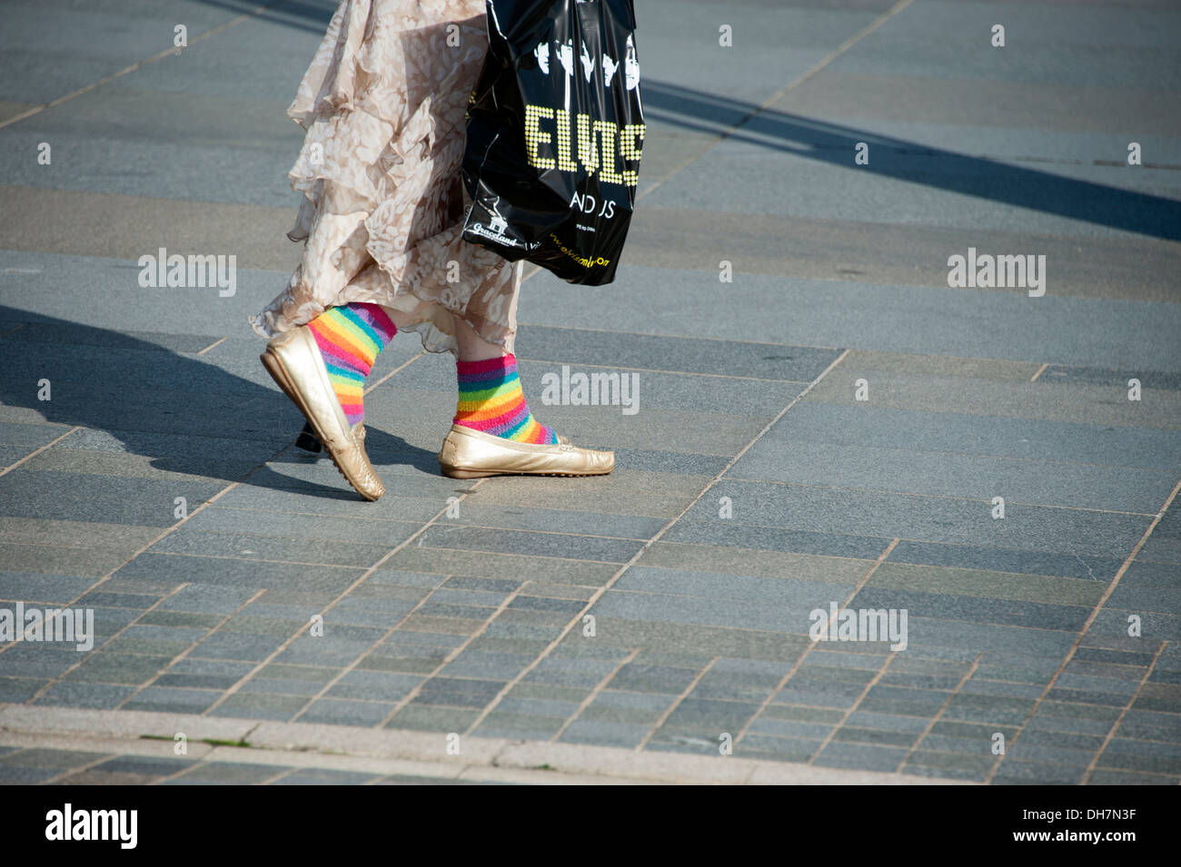 Brightly colourded socks rainbow stripy stripes Stock Photo