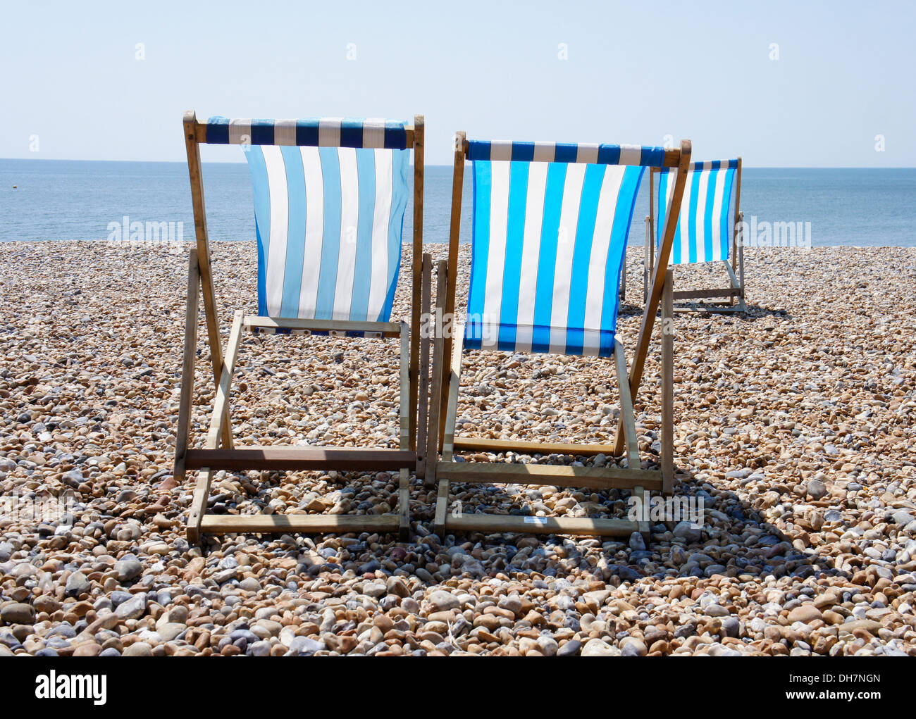 Deck chairs on the beach hi-res stock photography and images - Alamy