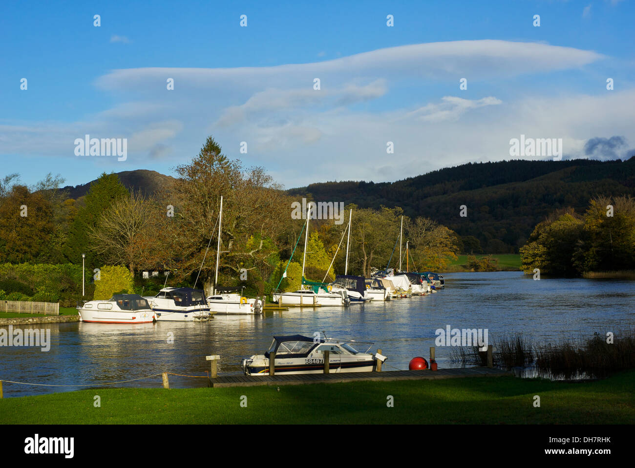 Boats moored at the Swan Hotel Marina, on the River Leven, Newby Bridge, Lake District National Park, Cumbria, England UK Stock Photo