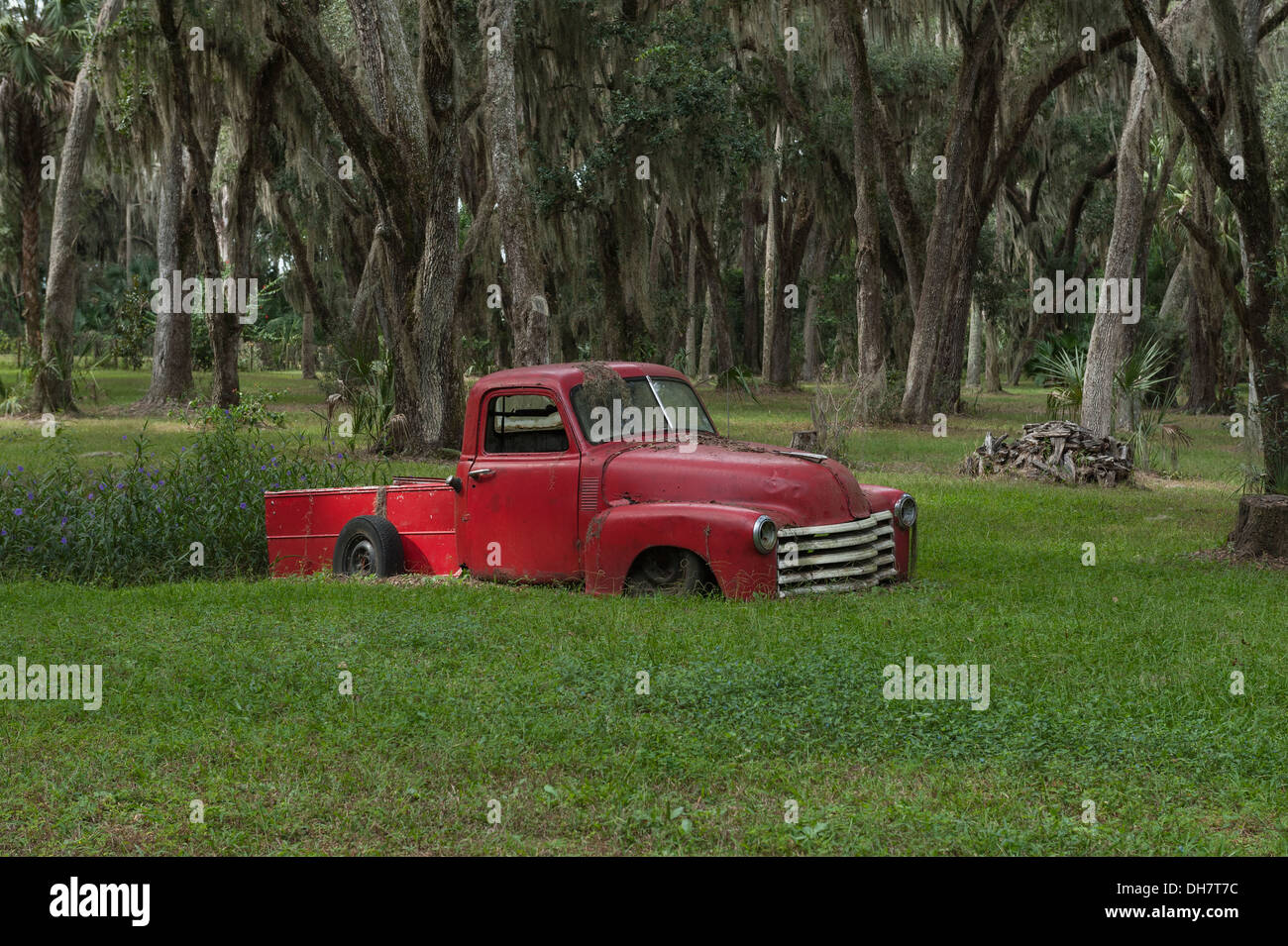 An old Chevrolet pickup truck being use as decoration on private property in Leesburg, Florida USA Stock Photo