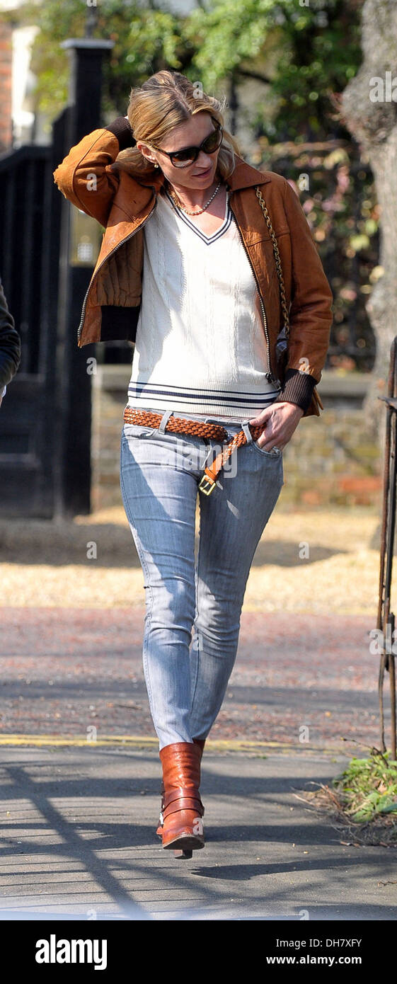 Kate Moss leaving her new house with her belt undone and her