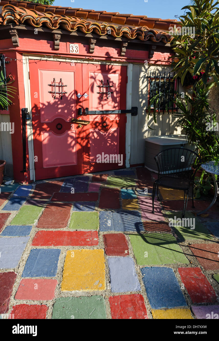 Colorful painted cement floor and a colorful building. Spanish Village Art Center at Balboa Park. San Diego, CA, USA. Stock Photo