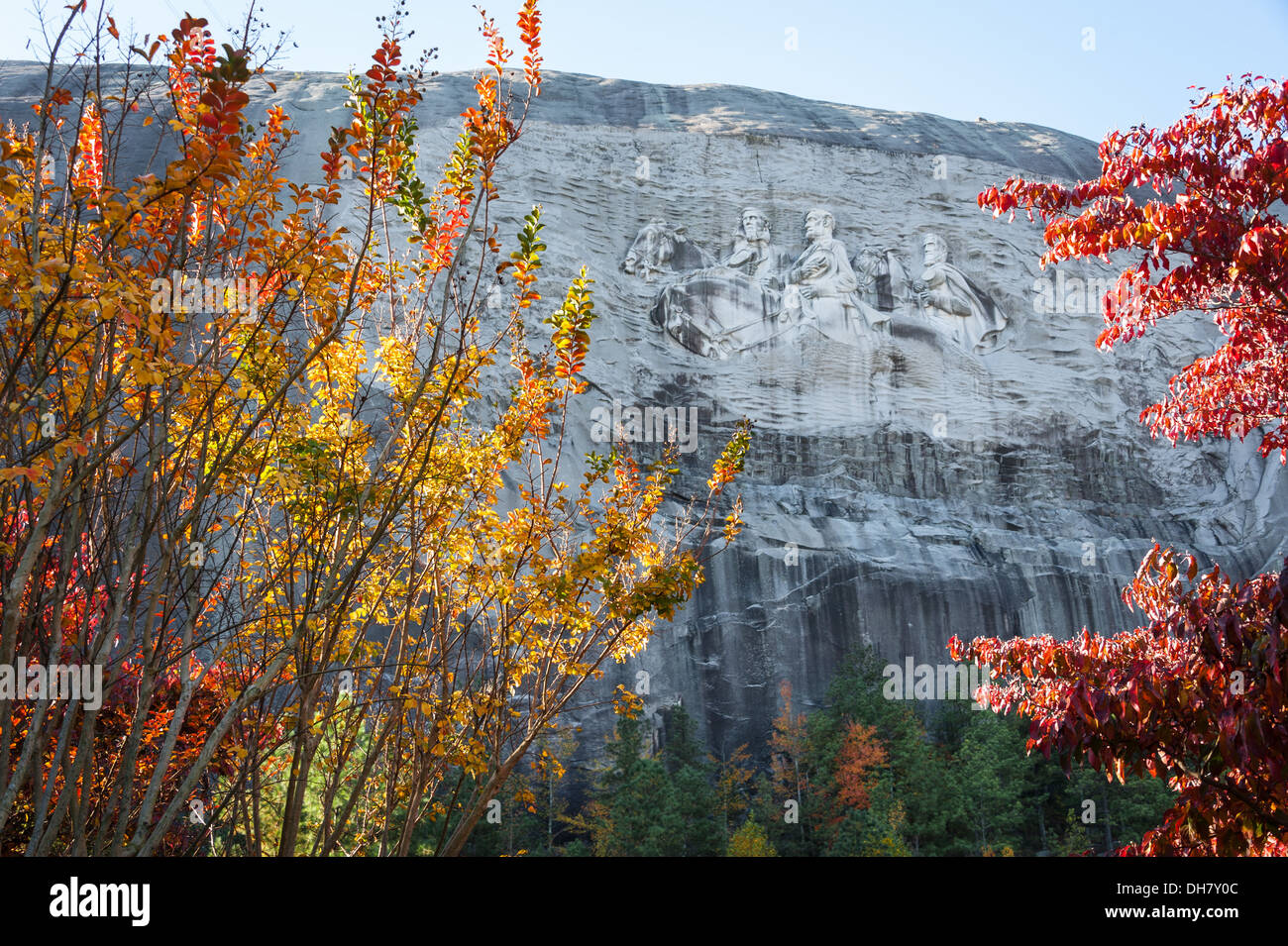 Fall colors on full display beneath the Confederate Memorial Carving at Stone Mountain Park near Atlanta, Georgia. (USA) Stock Photo
