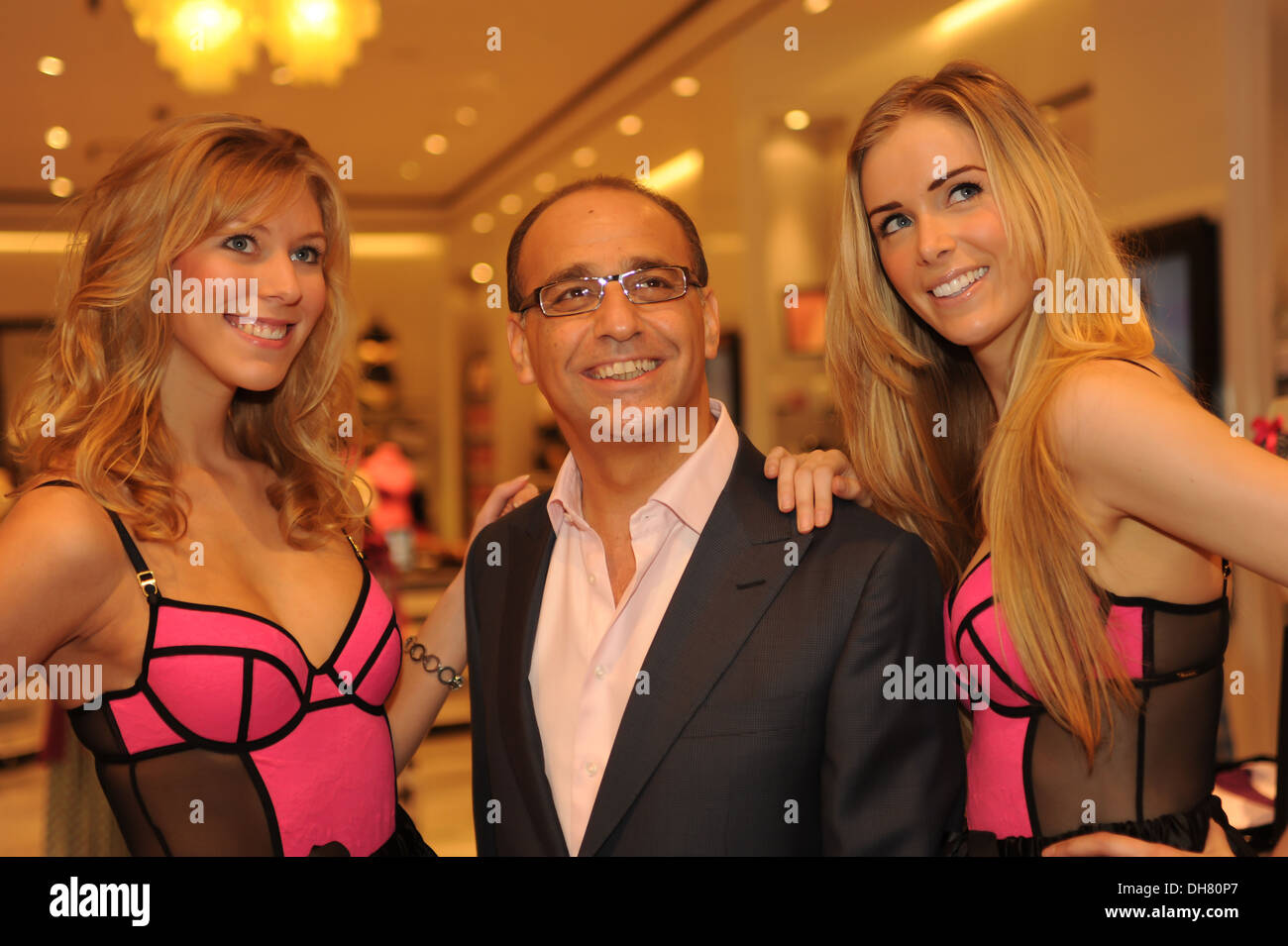Entrepreneur and Dragon's Den star Theo Paphitis and Boux Avenue models at  official opening of new Boux Avenue store at Stock Photo - Alamy