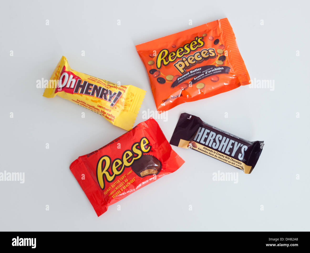 Various chocolate and candy manufactured by The Hershey Company.  Canadian Halloween 'fun size' shown. Stock Photo