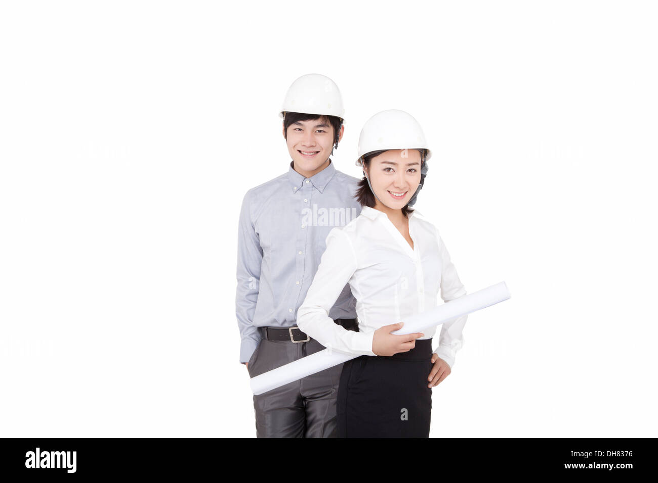 Business people wearing helmets Stock Photo