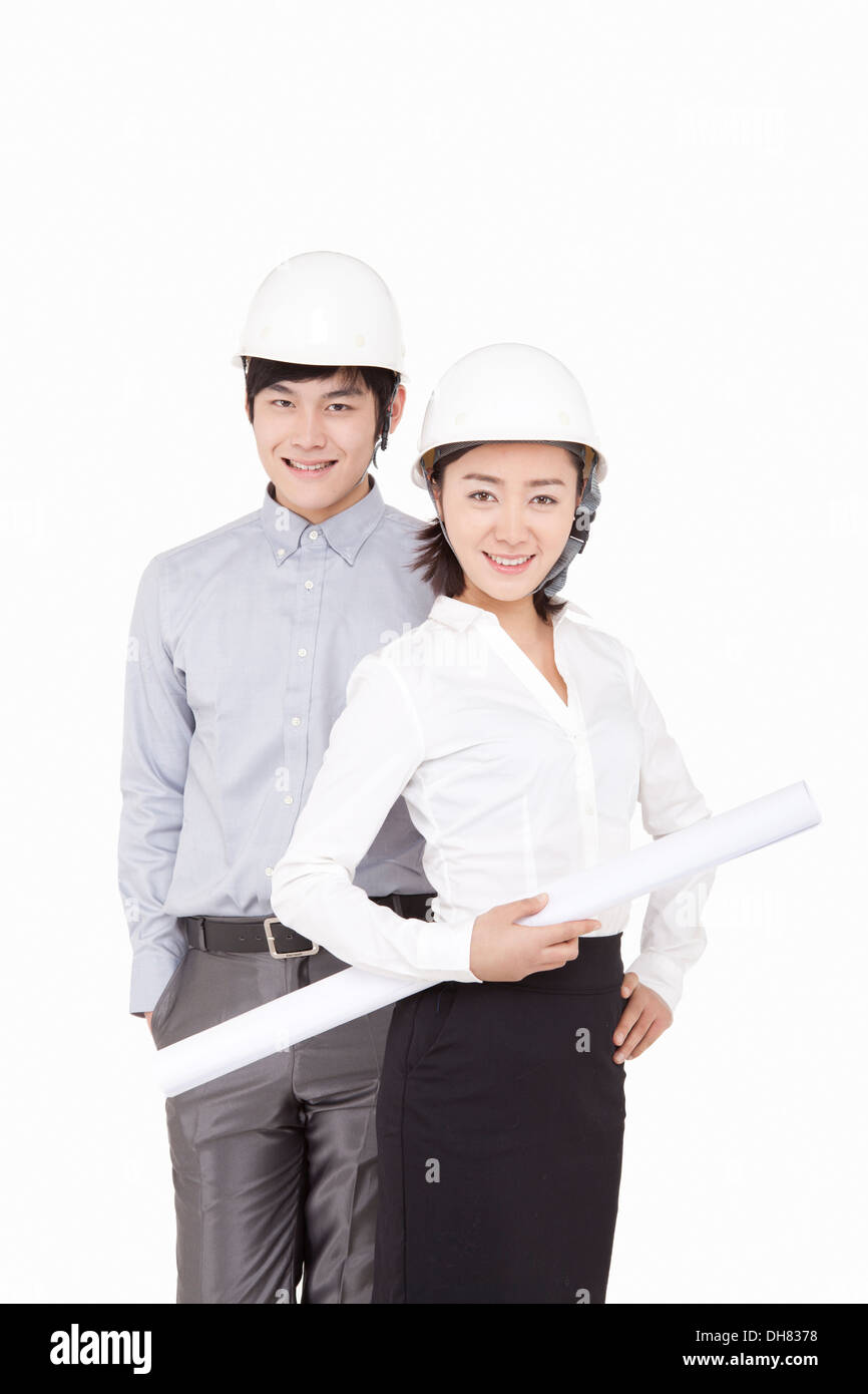 Business people wearing helmets Stock Photo