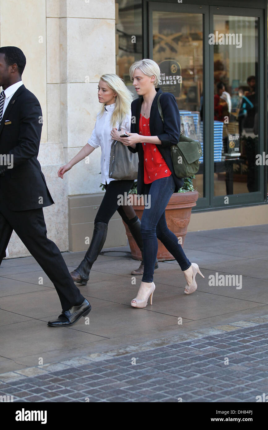 Amber Heard and her sister Whitney Heard are seen walking together