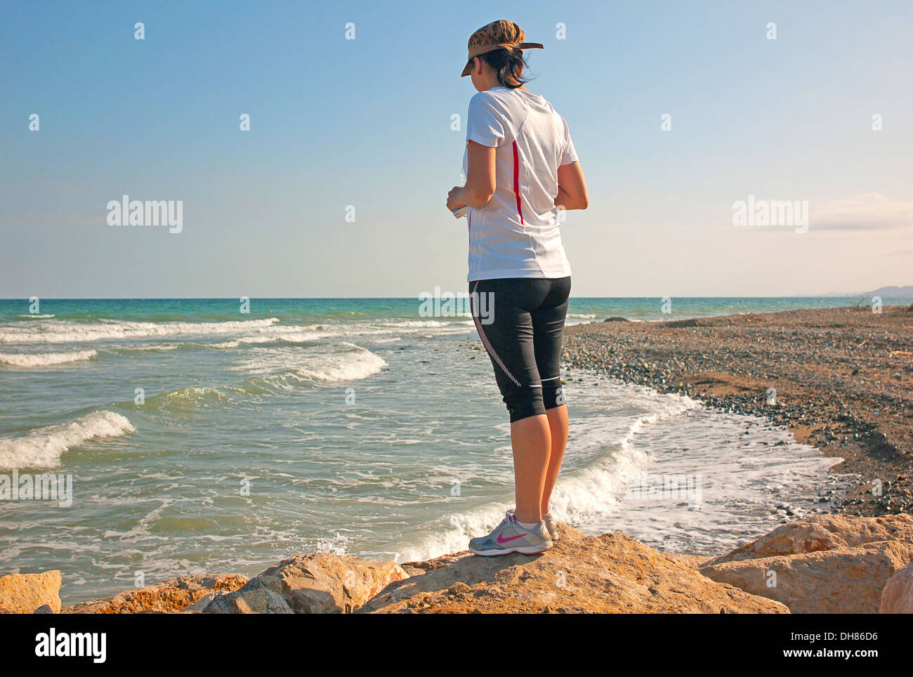 -Woman looking Mediterranean Sea Stock Photo - Alamy