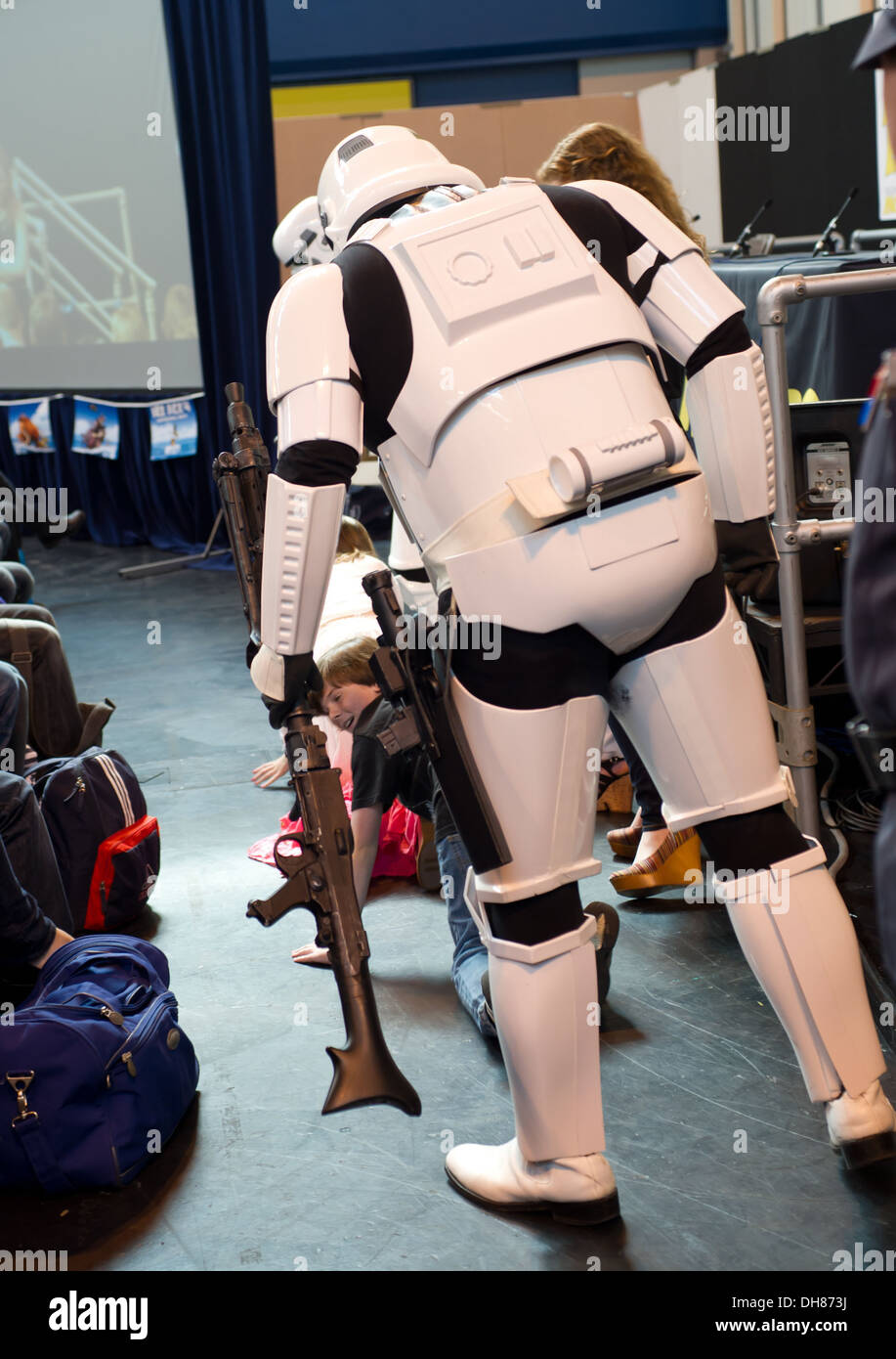 Stormtroopers play a April Fool's Day prank on Chandler Riggs and Maddison Mackenzie and arrest them 2012 Memorabilia Show at Stock Photo