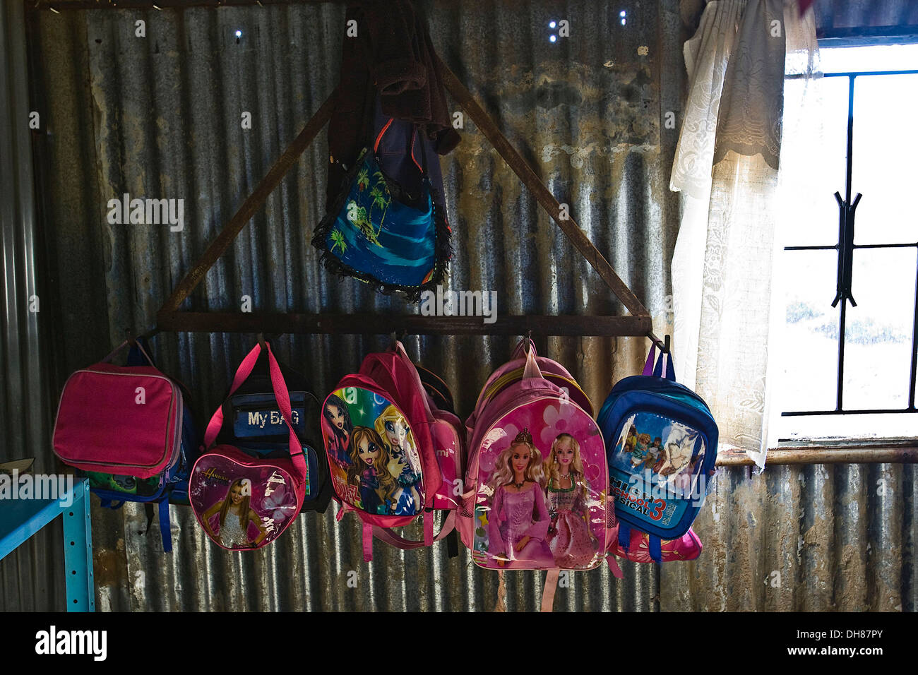 School bags belonging to the pupils at Itsoseng crèche where Bricks Mokolo often visits to give talks to sanitation and the Stock Photo