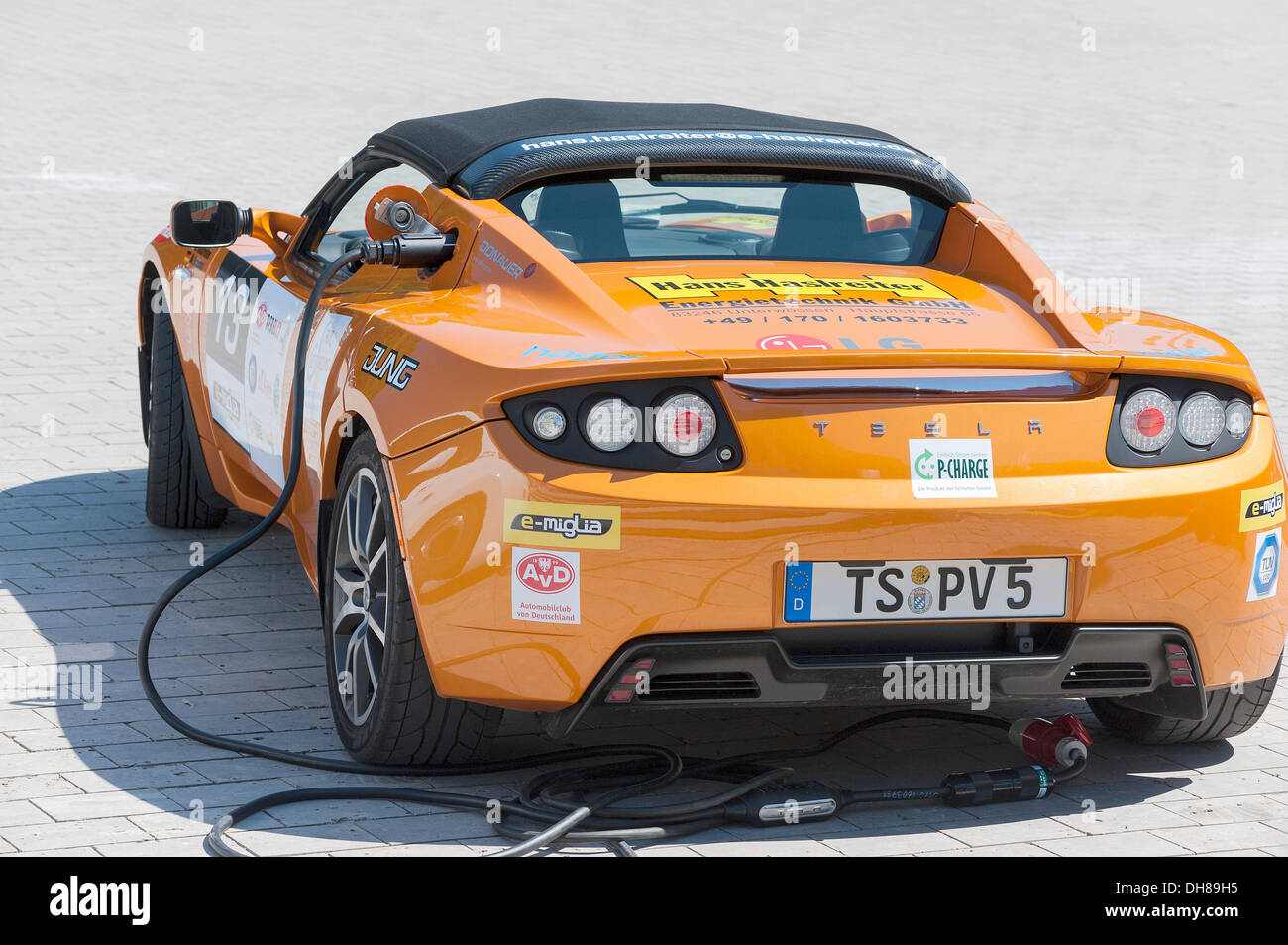 Tesla Roadster, an American electric sports car having its batteries charged before the prologue of the e-miglia 2012 from Stock Photo