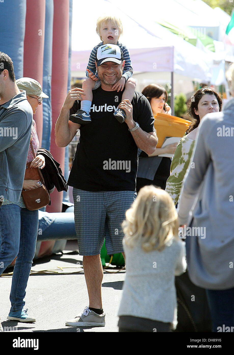 Liev Schreiber holds his son Alexander Pete at a farmers market in Brentwood Los Angeles California - 01.04.12 Stock Photo