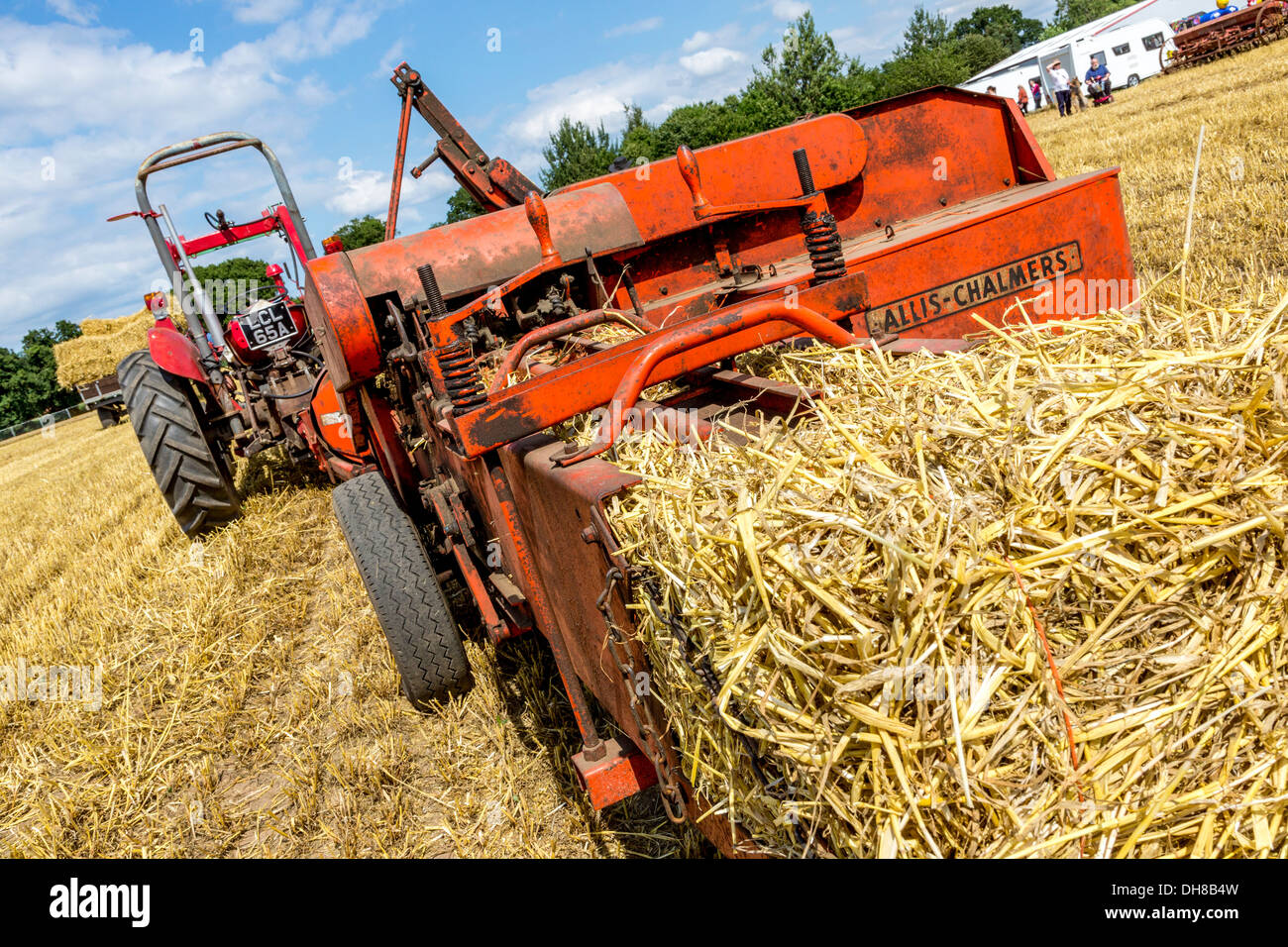 AllisChalmers baler being demonstrated at the 2013 Starting Handle