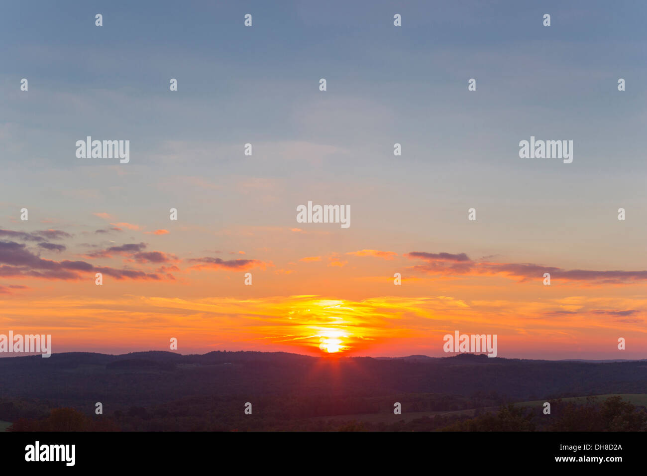 SUNSET OVER LAND Stock Photo