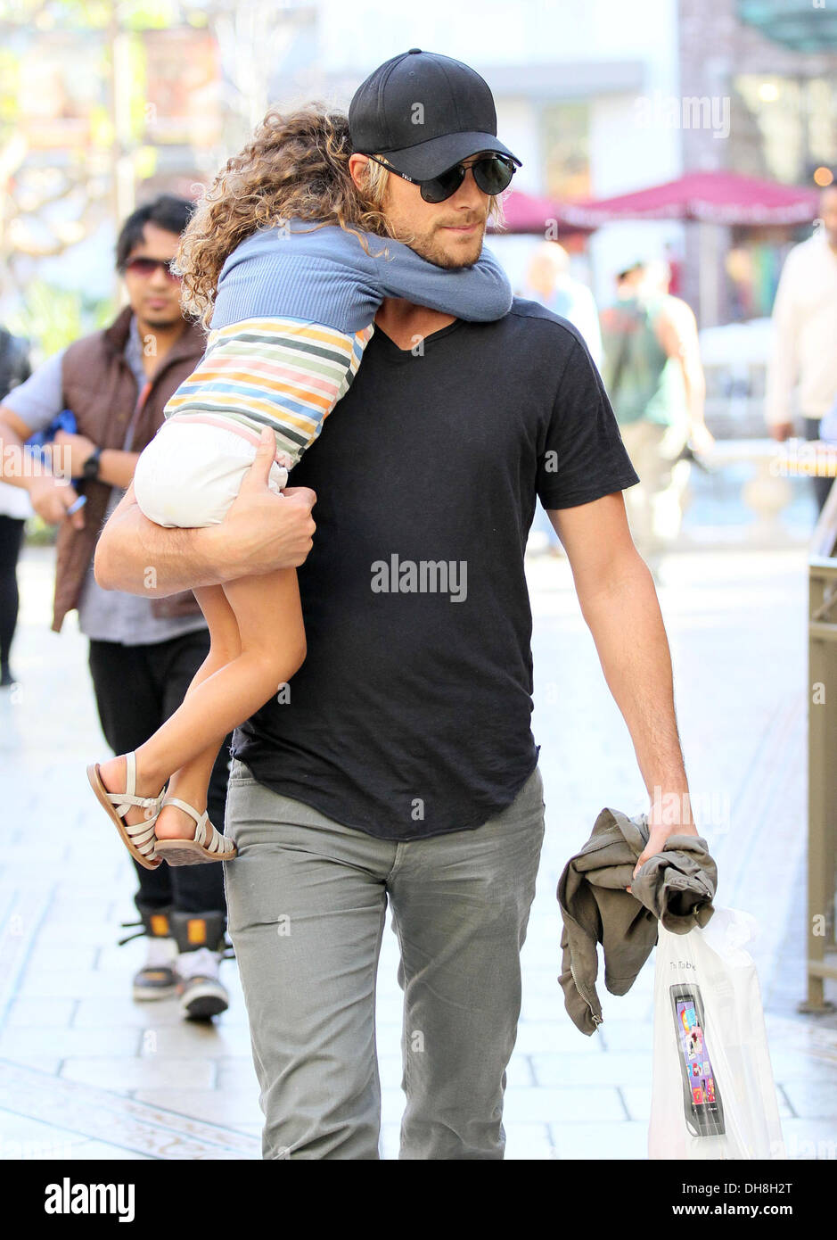 Gabriel Aubry and his daughter Nahla Aubry are seen walking through