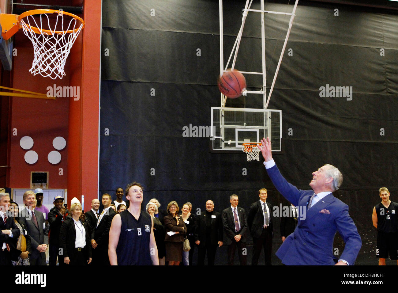 Prince Charles Prince of Wales shows off his basketball skills during a visit to Fryshuset an