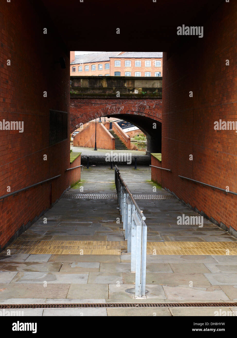 Walking under Chester Road into Castlefield Manchester UK Stock Photo