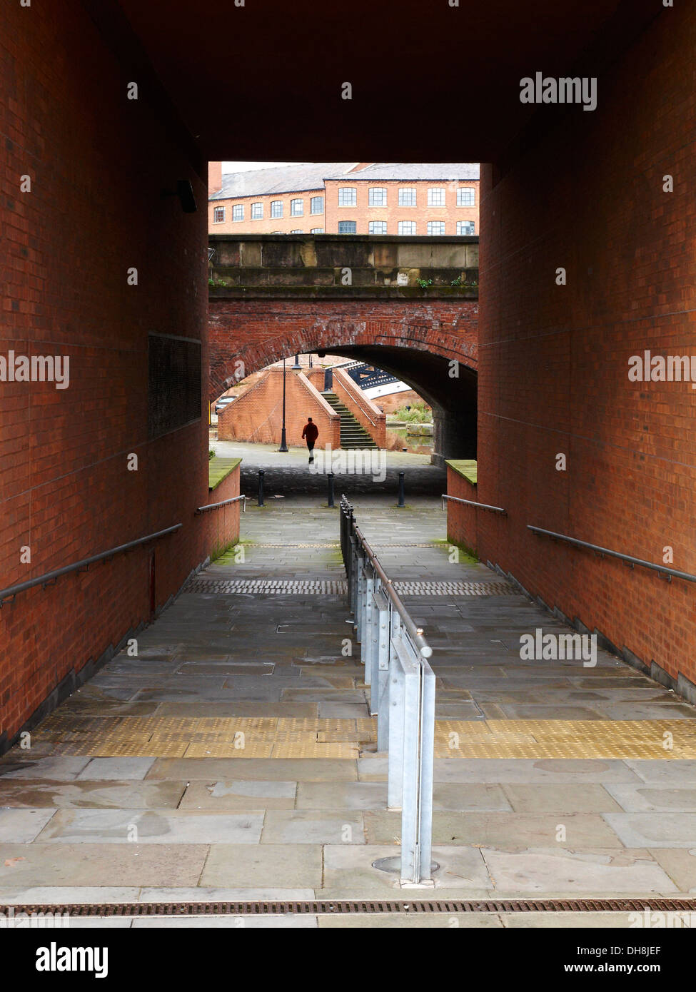 Walking under Chester Road into Castlefield Manchester UK Stock Photo