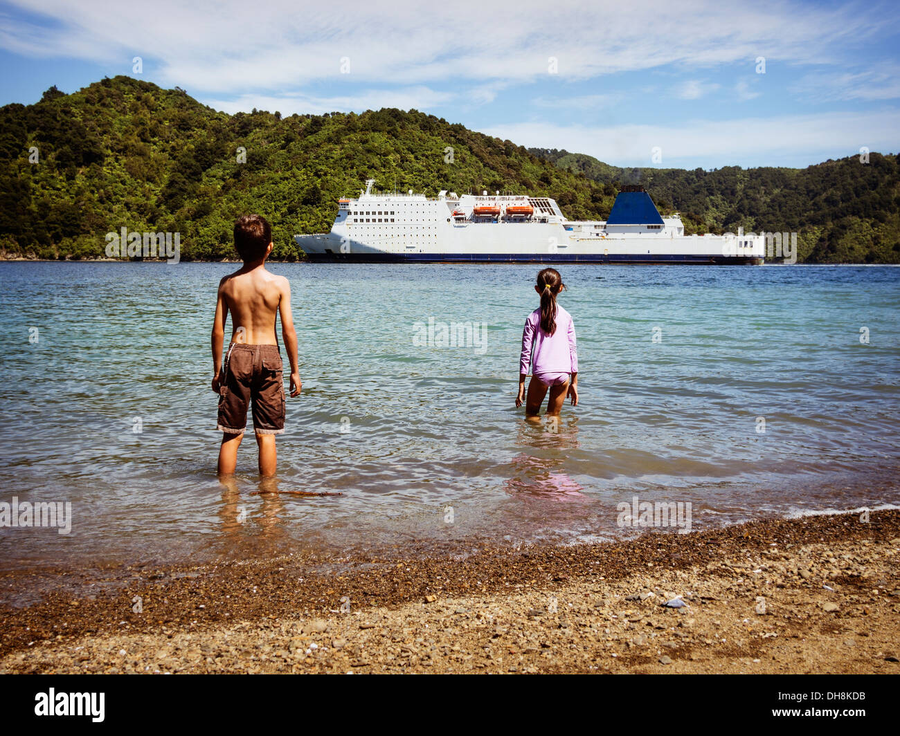Watching the ferry arrive, Picton, Marlborough Sounds, New Zealand. Logos removed. Stock Photo