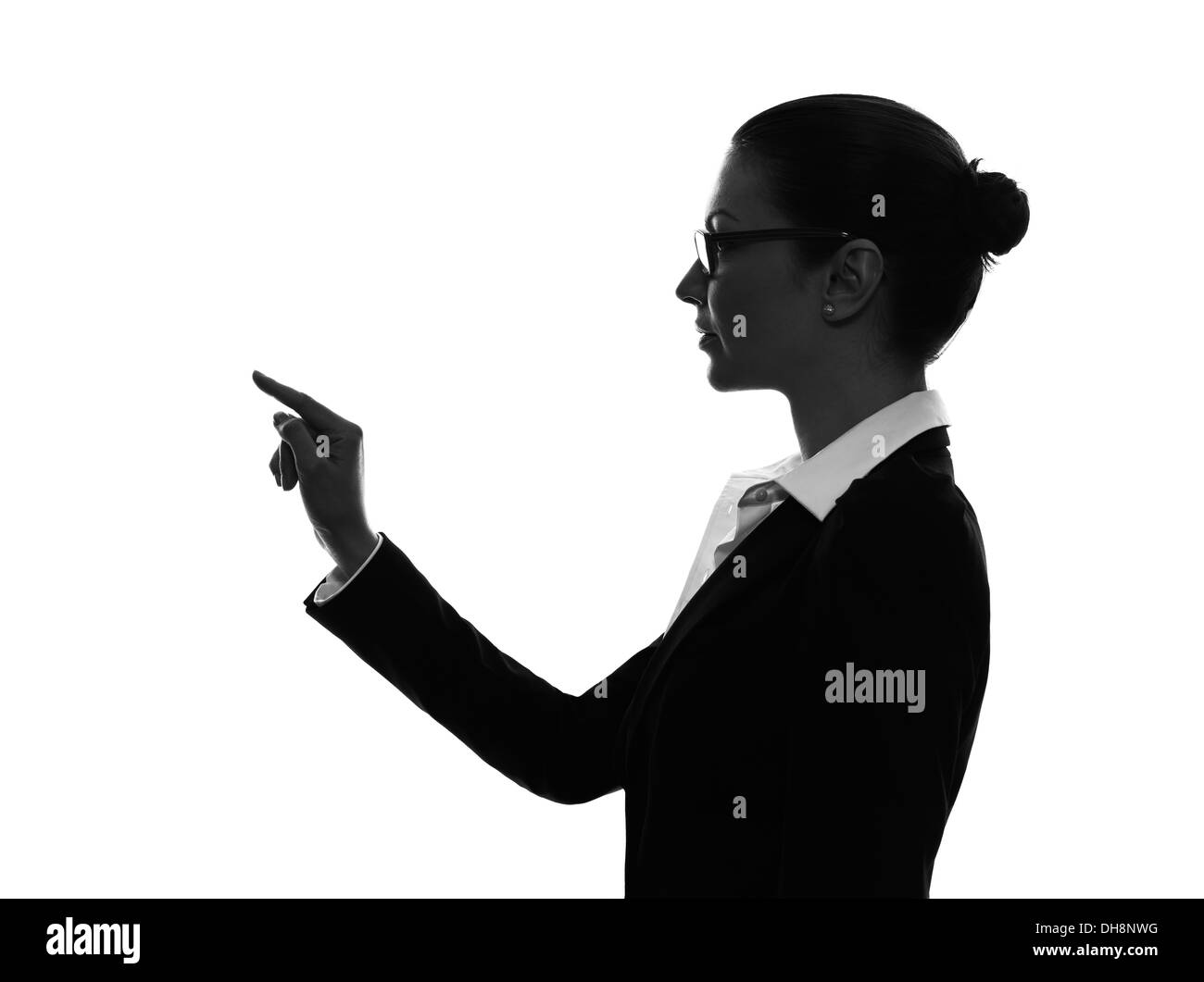 one  business woman touching copy sapce in silhouette on white background Stock Photo