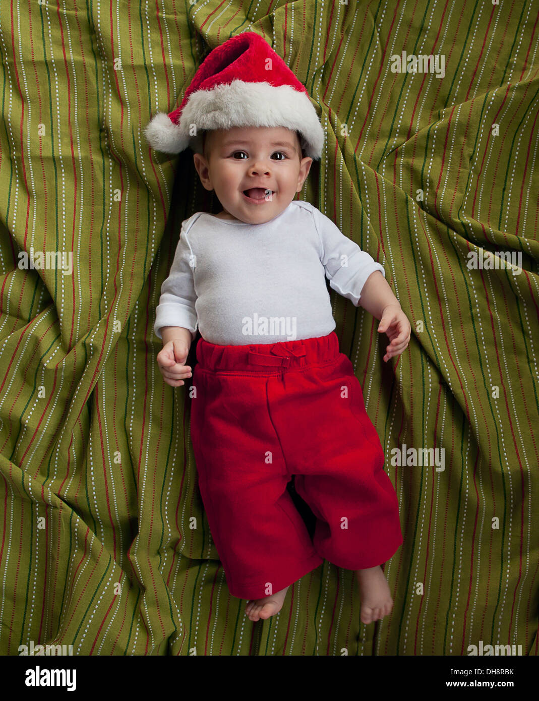 Baby in santa hat Stock Photo