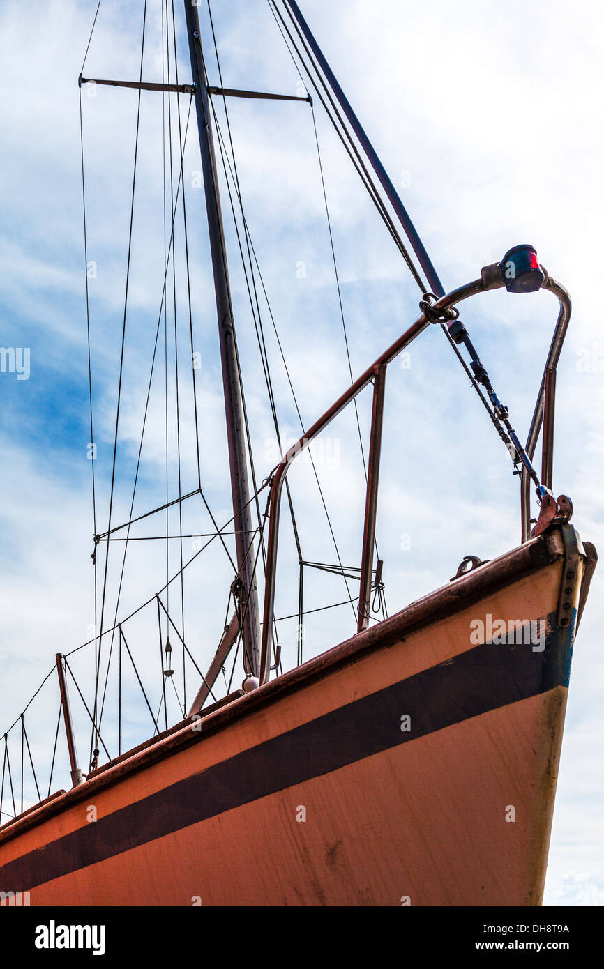 Closeup of the hull of a yacht in dry dock awaiting maintenance and