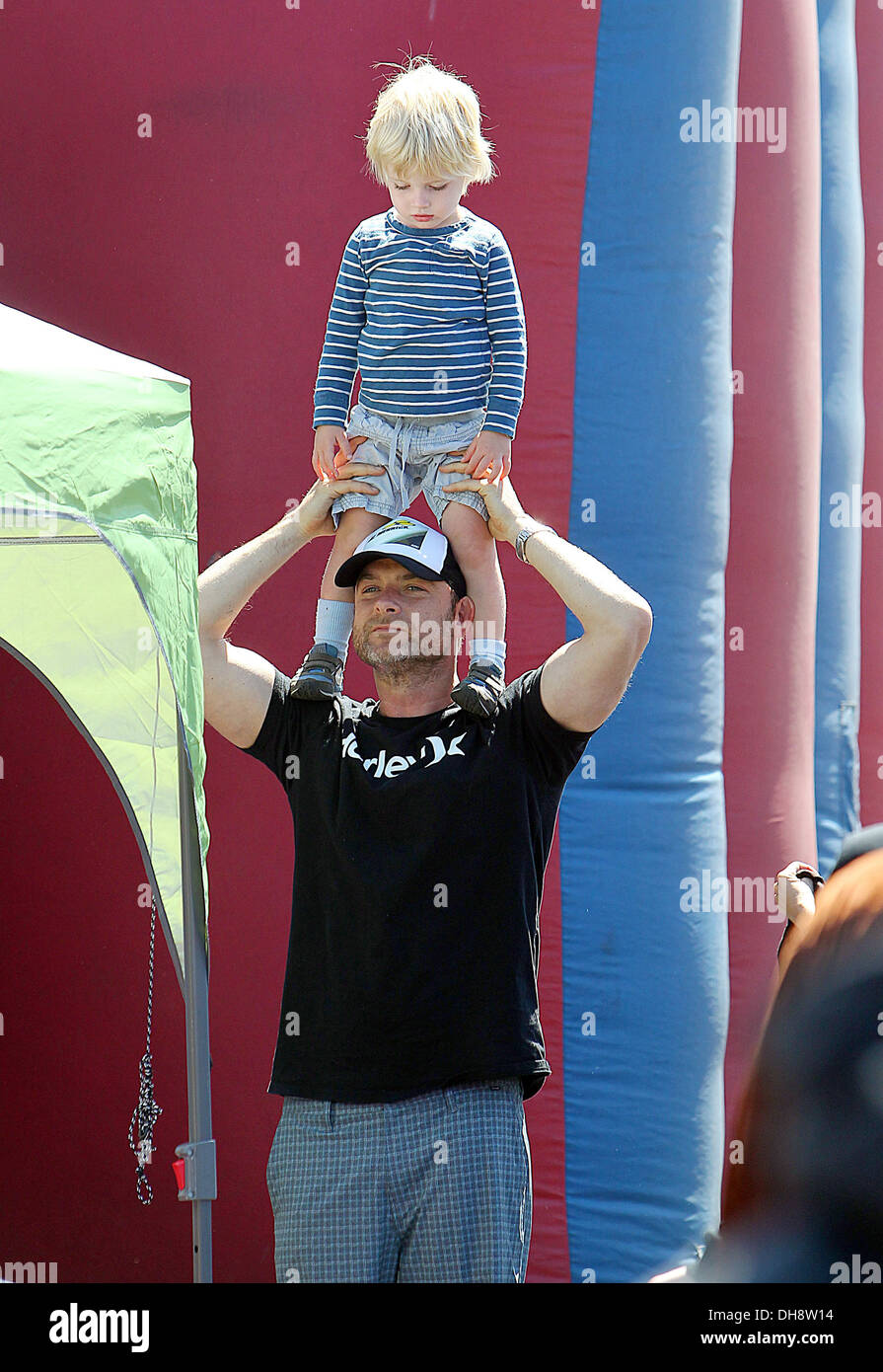 Liev Schreiber holds his son Alexander Pete at a farmers market in Brentwood Los Angeles California - 01.04.12 Stock Photo